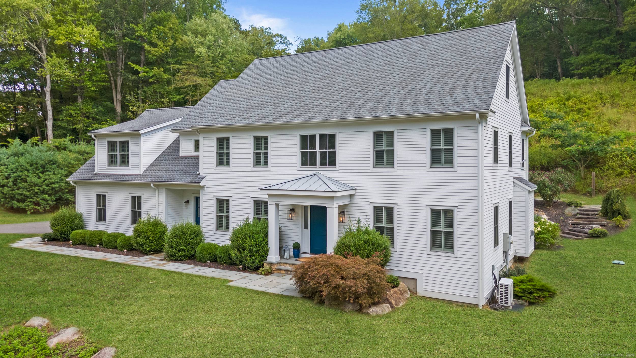 Welcome to 225 Good Hill Road in Weston, Connecticut a modern transitional Colonial where timeless elegance meets contemporary design.