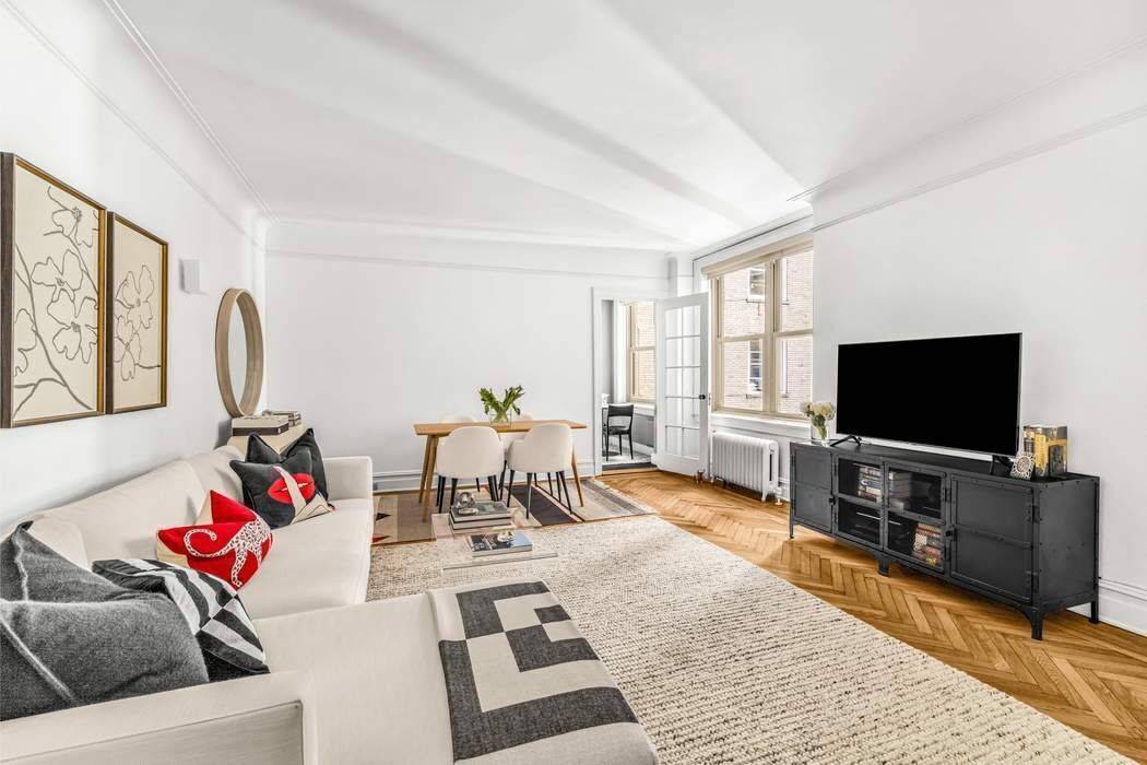 Spacious and meticulously maintained one bedroom apartment, perched on the 6th floor, showcases an elegant flow, recently refinished hardwood herringbone floors, and high ceilings.