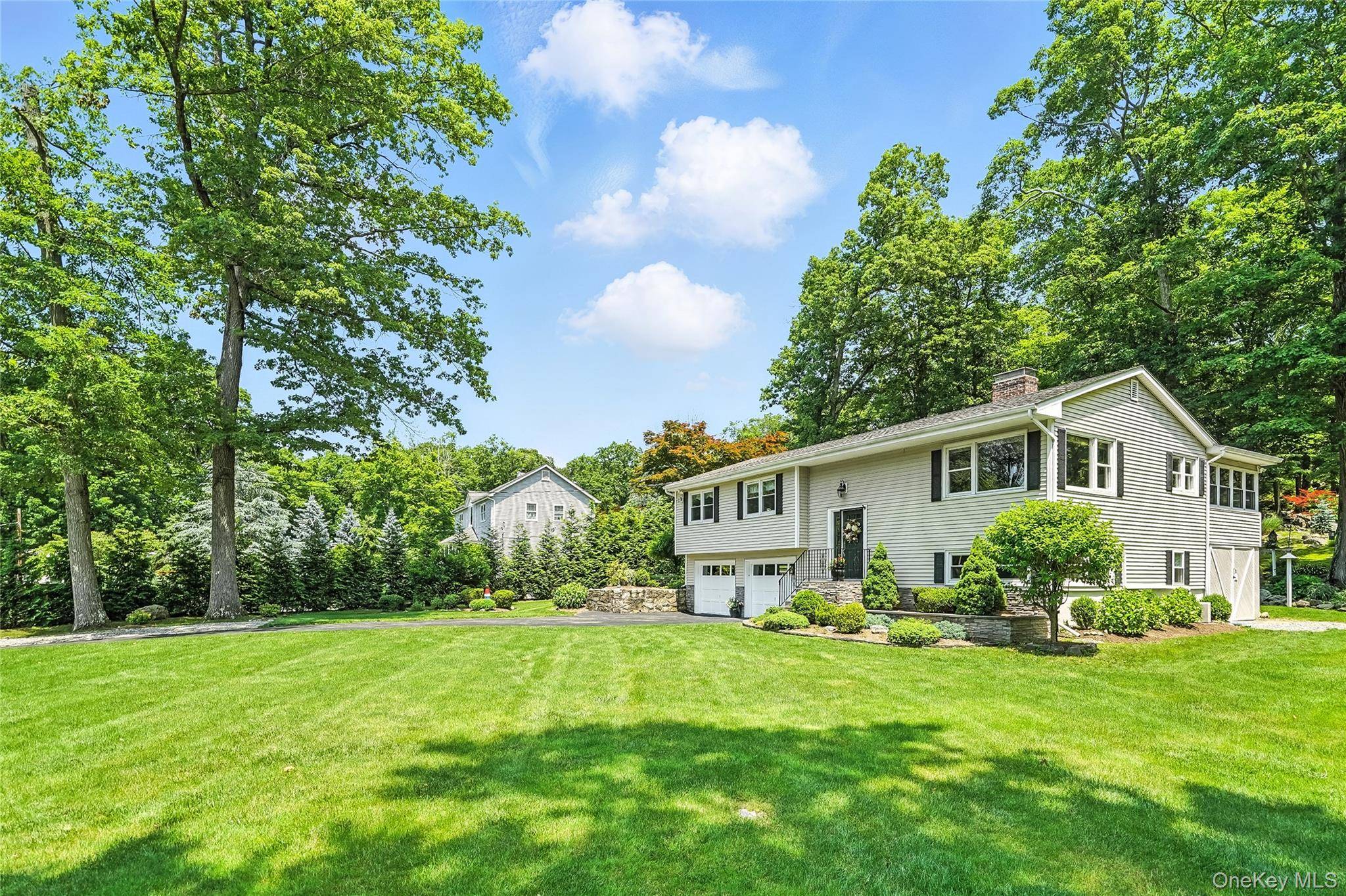 Welcome to 69 Clove Brook Drive, meticulously maintained well loved ranch on a quiet cul de sac, situated on 1 plus acres with mature plantings, specimen trees and rock outcroppings ...