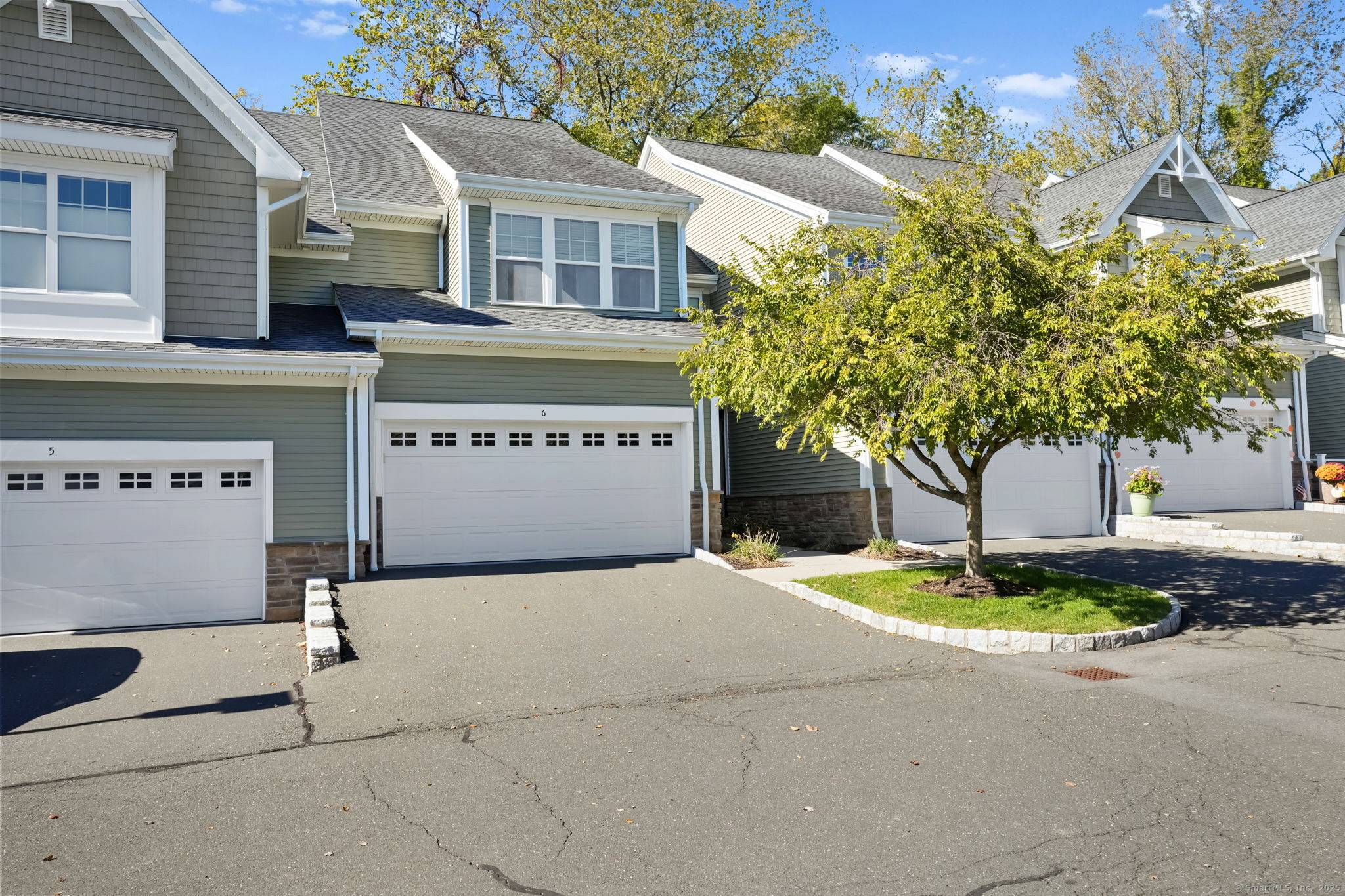 Welcome to 6 Bristol Terrace, a beautifully maintained townhome in The Villages at Timber Oak a premier community known for its resort style amenities and maintenance free living on 50 ...
