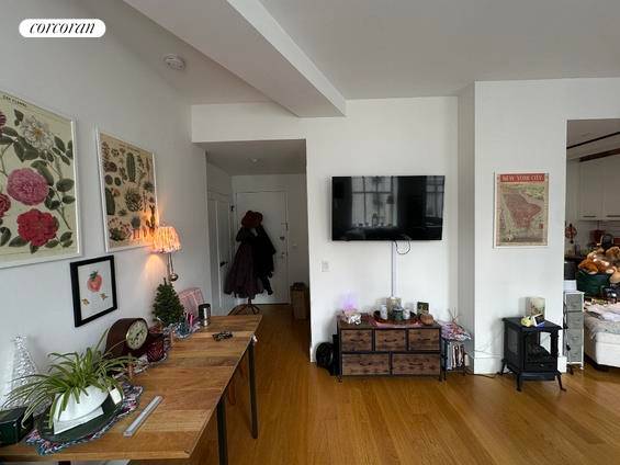 Amazing short term furnished Studio apartment featuring a renovated kitchen beautifully outfitted with custom cabinets and stainless steel appliances.