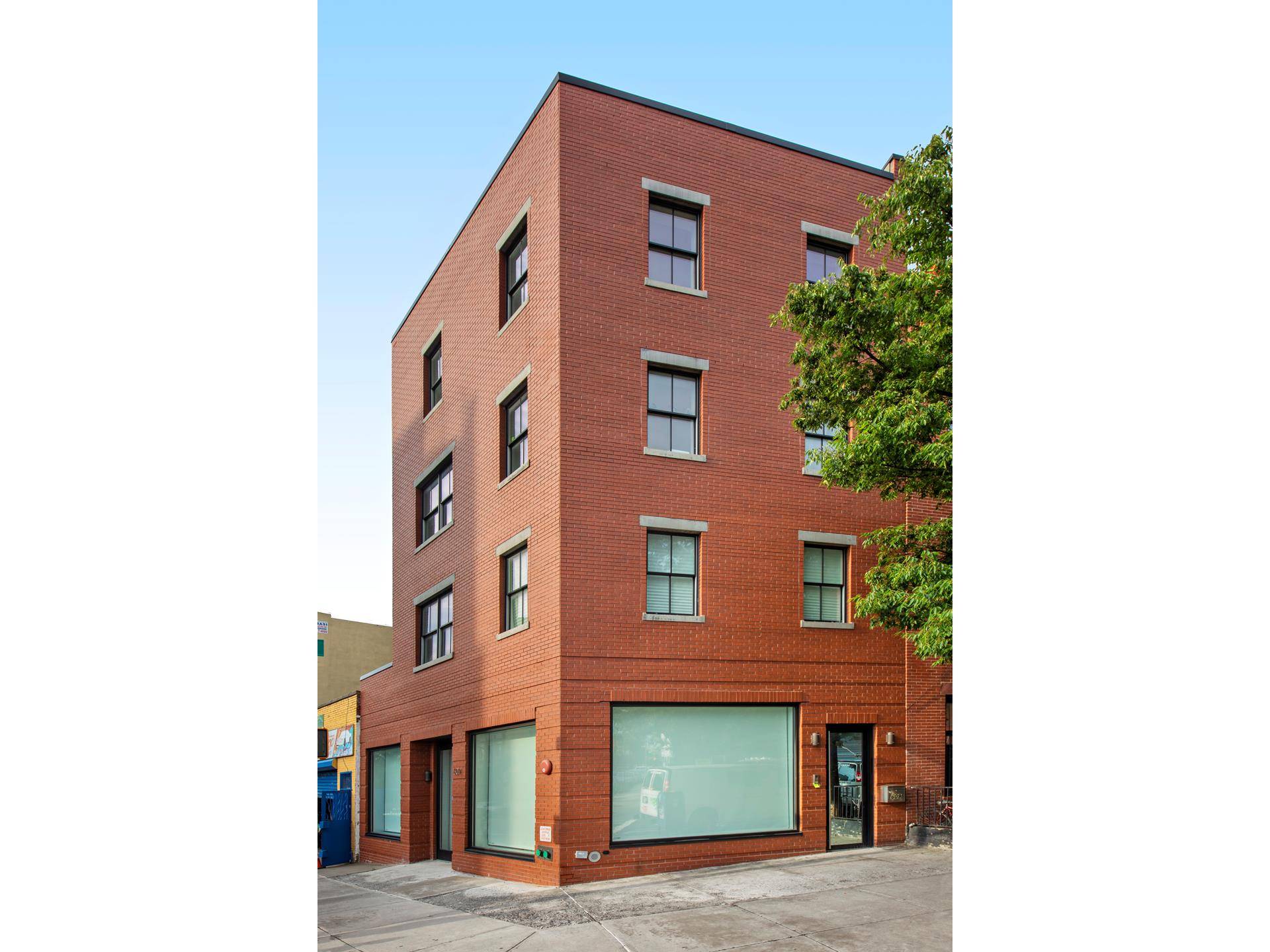 Light filled corner building in great move in condition, in a terrific neighborhood, offers a range of uses.