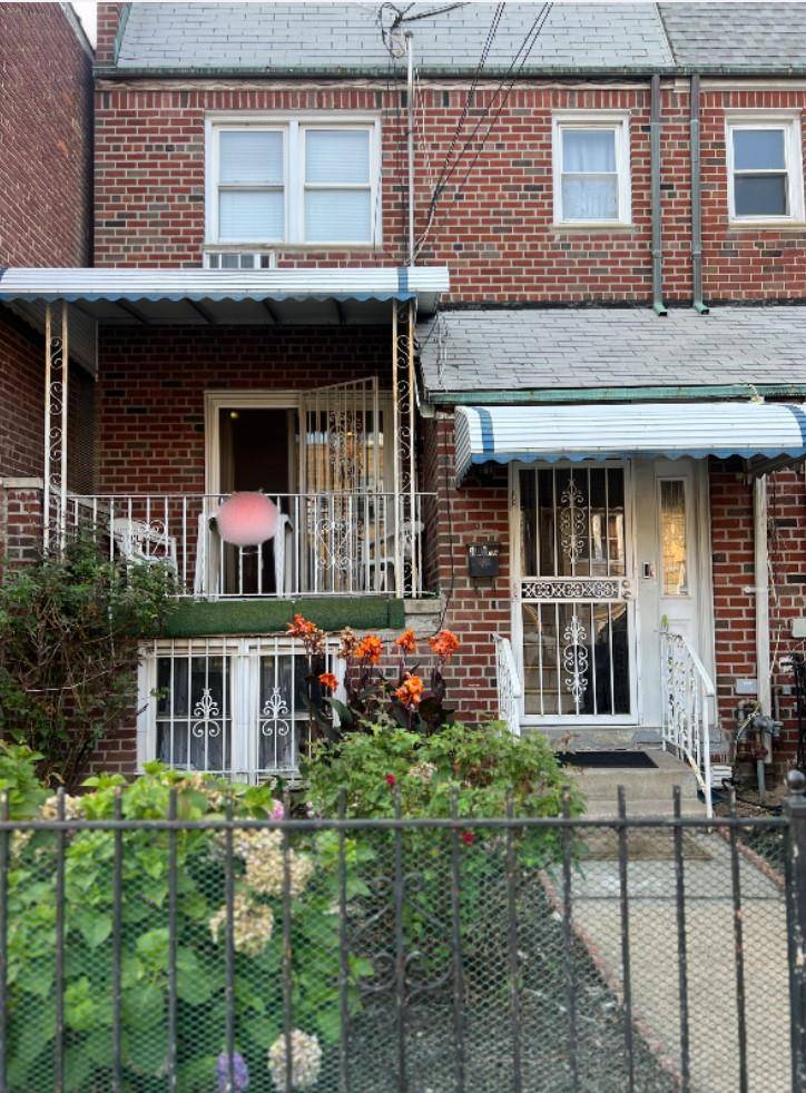 Beautiful and well maintained 2 family home in the heart of Corona.