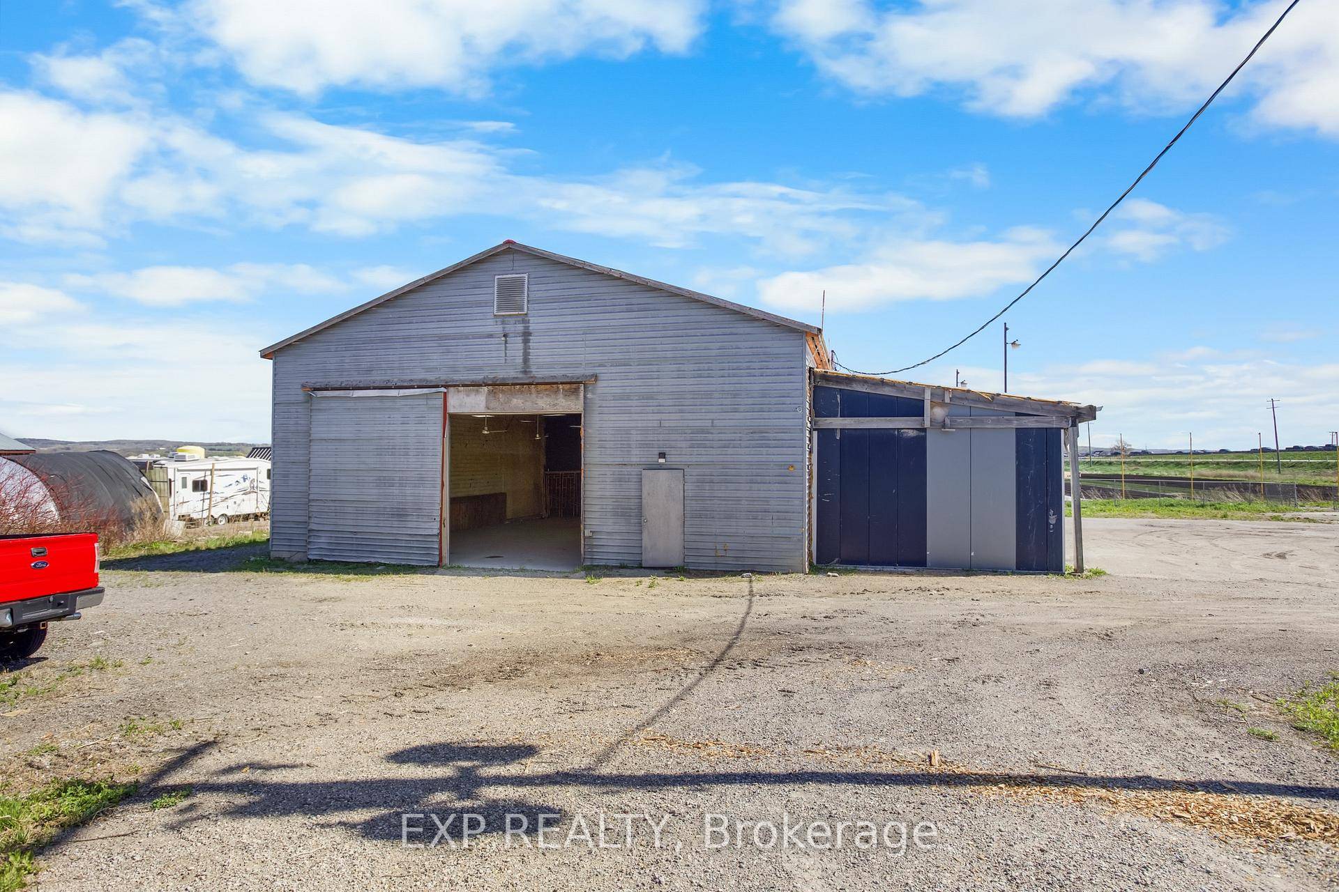 Rare opportunity to purchase approximately 4, 500 sq ft of versatile barn space situated on 8.
