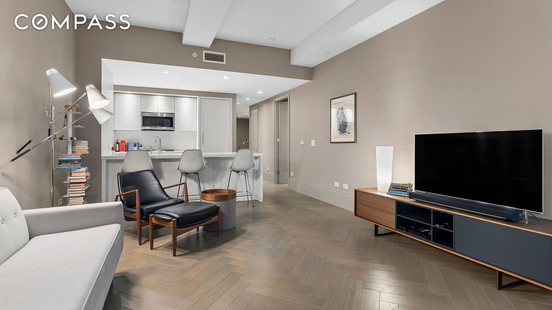 Welcome to Residence 7C at 101 Wall Street a home that offers a new development feel without the new development pricing.