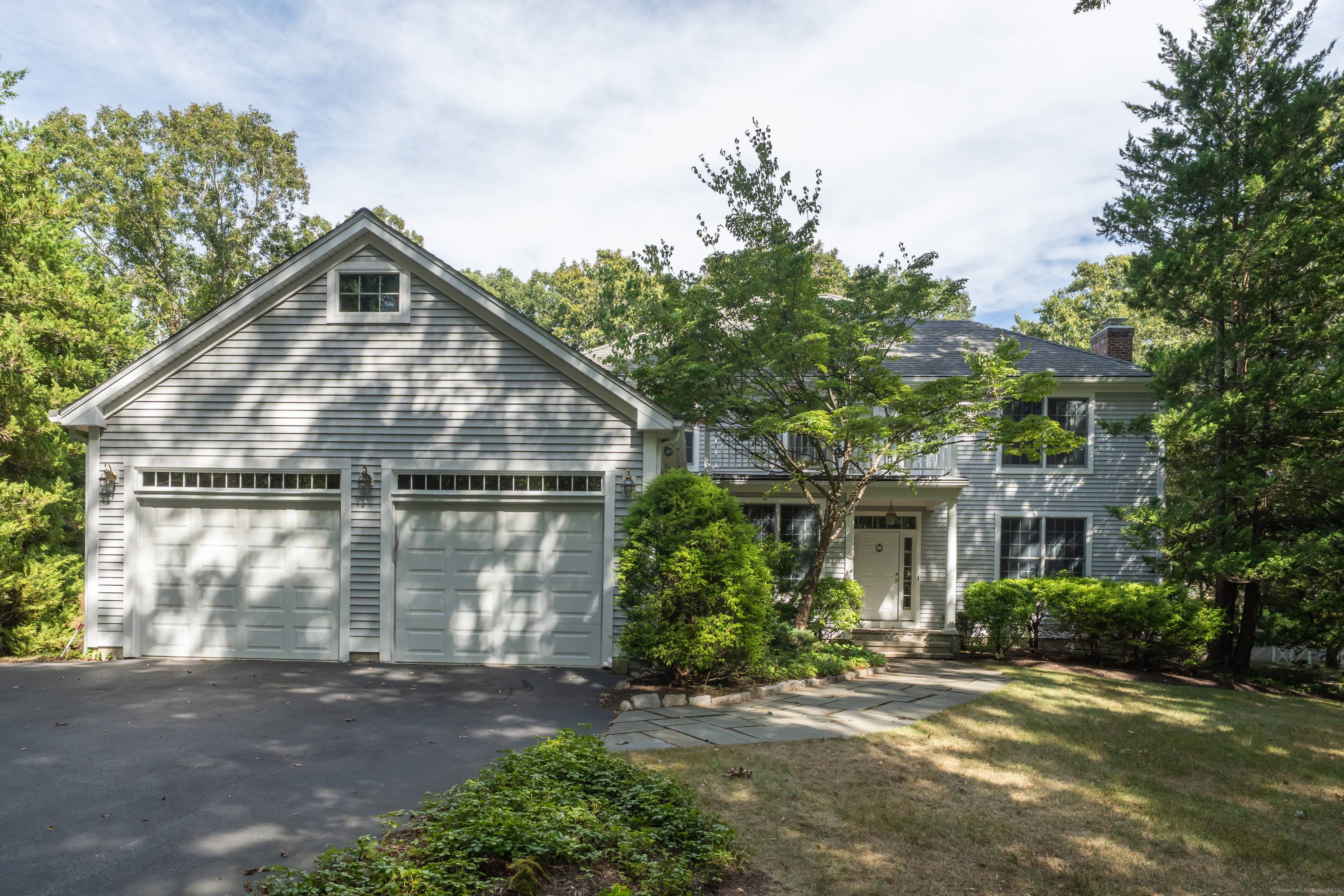 Welcome to 22 Riverdale Landing, this custom built New England home combines timeless charm with modern comfort.