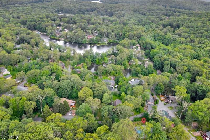 Welcome to this awesome lake house in the beautiful Shady Lake community in lower west Milford !