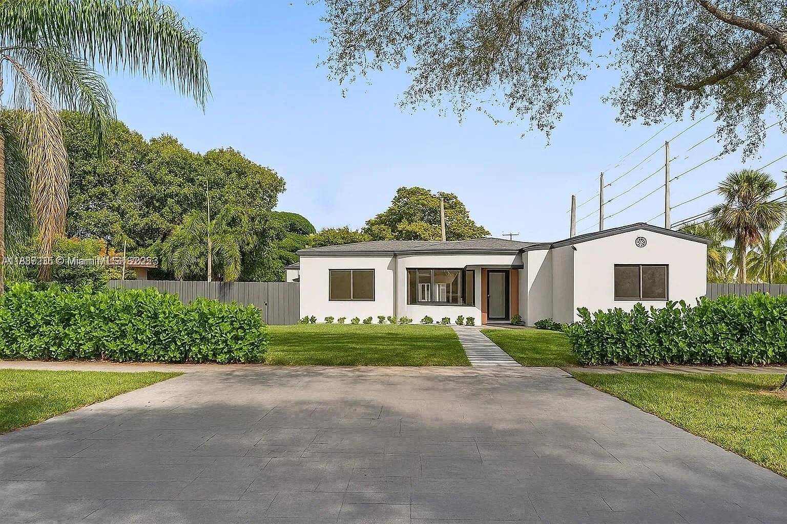 Renovated from top to bottom, this Miami Shores residence blends timeless style with a flexible floor plan.