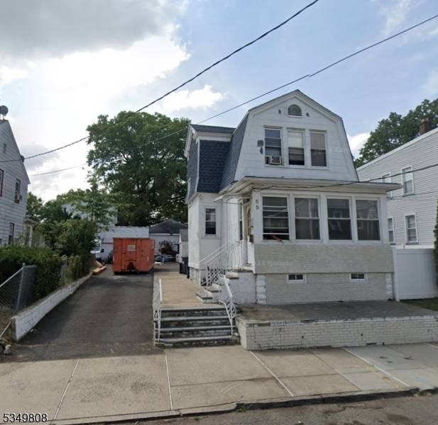 Incredible opportunity to build a spacious two family home featuring three levels of living space plus a basement.