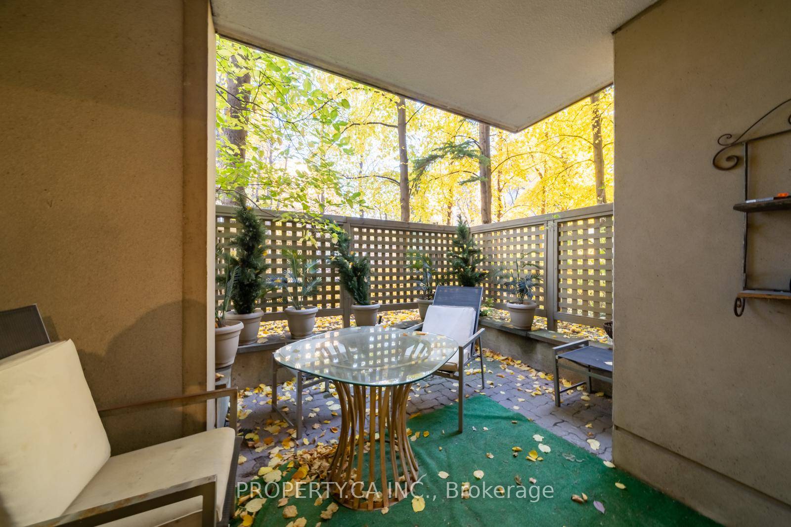 Utilities, Parking and Locker All Inclusive Condo Townhouse with Walk Out to a Secluded Private Patio.