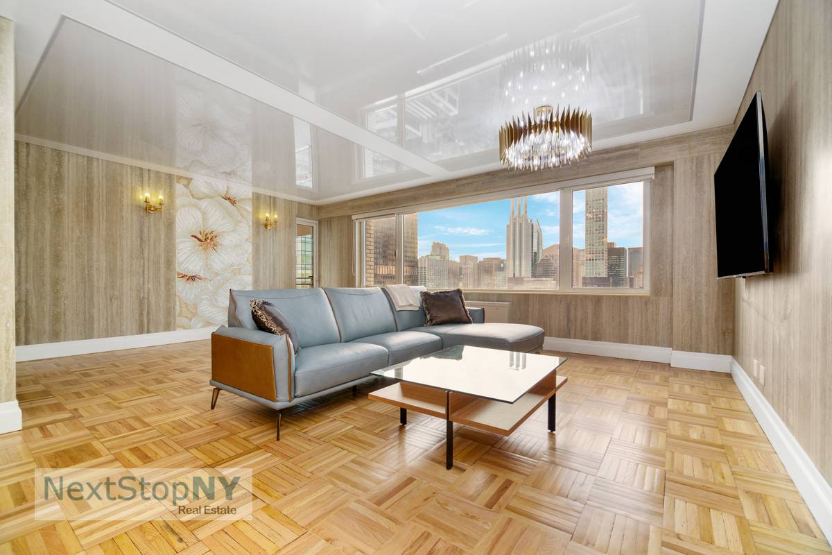 Indulge in unparalleled sophistication and luxury within this meticulously renovated New York City apartment, offering panoramic skyline and Central Park views.