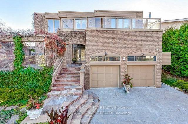 This exquisite custom built home showcases unmatched beauty and exceptional craftsmanship, making it a true gem in the highly sought after Bayview Woods neighborhood.