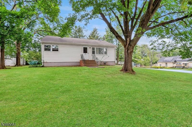 Looking for a move in ready ranch on a spacious corner lot ?