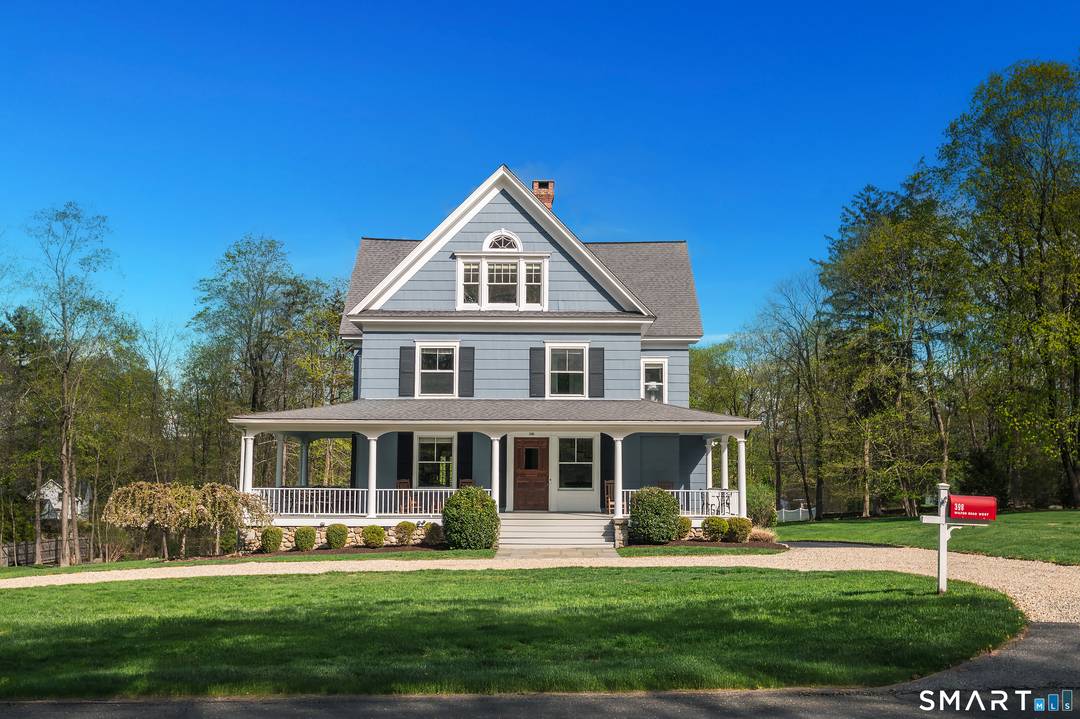 Walk to the heart of Ridgefield from one of its most admired residences.