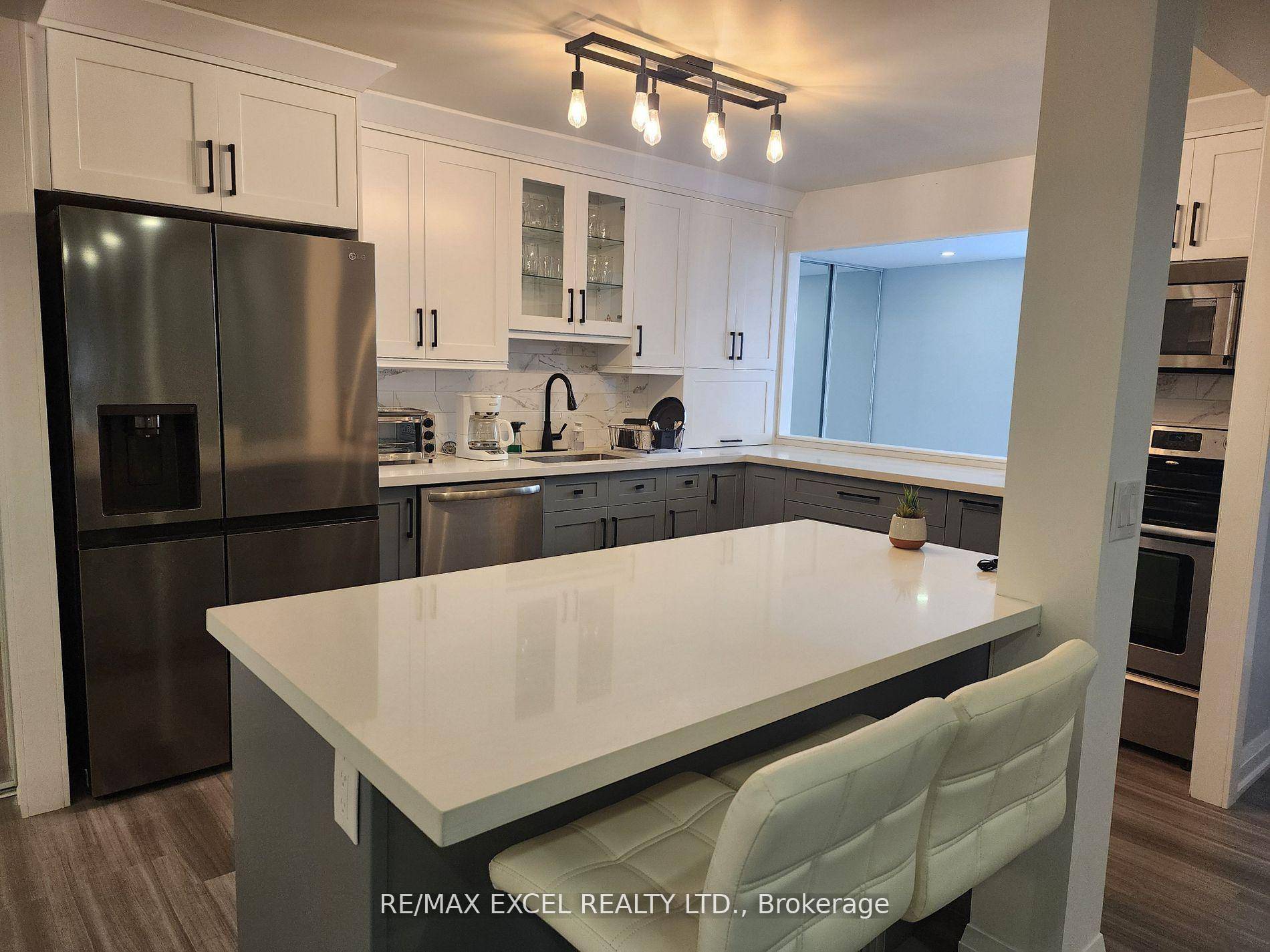 Luxurious Tridel 2 1 Bedrooms 2 Full Baths Corner Unit with Modern Finishes.