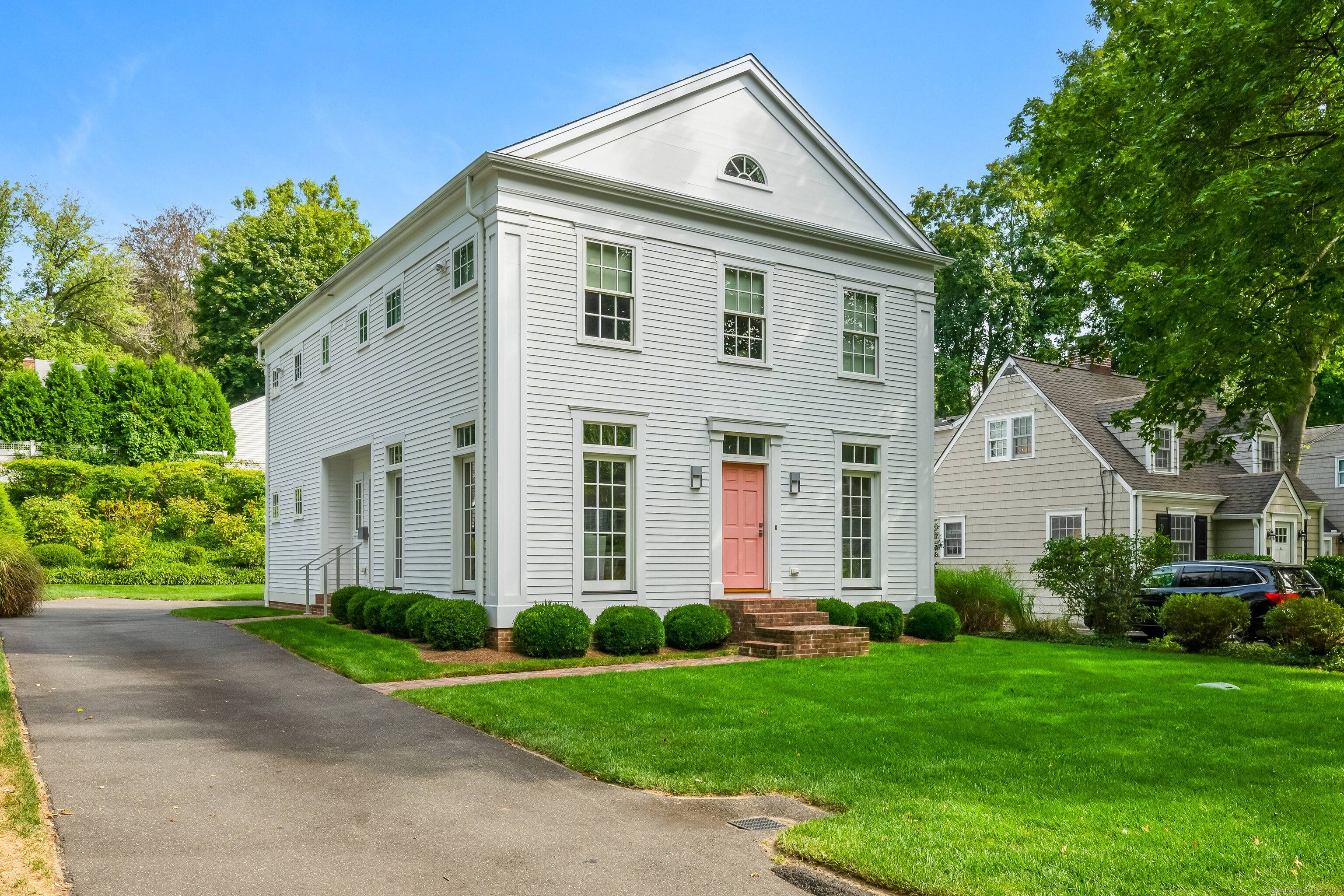 Welcome to 3 Devon Road, a modern gem on a tree lined street in a desirable neighborhood.