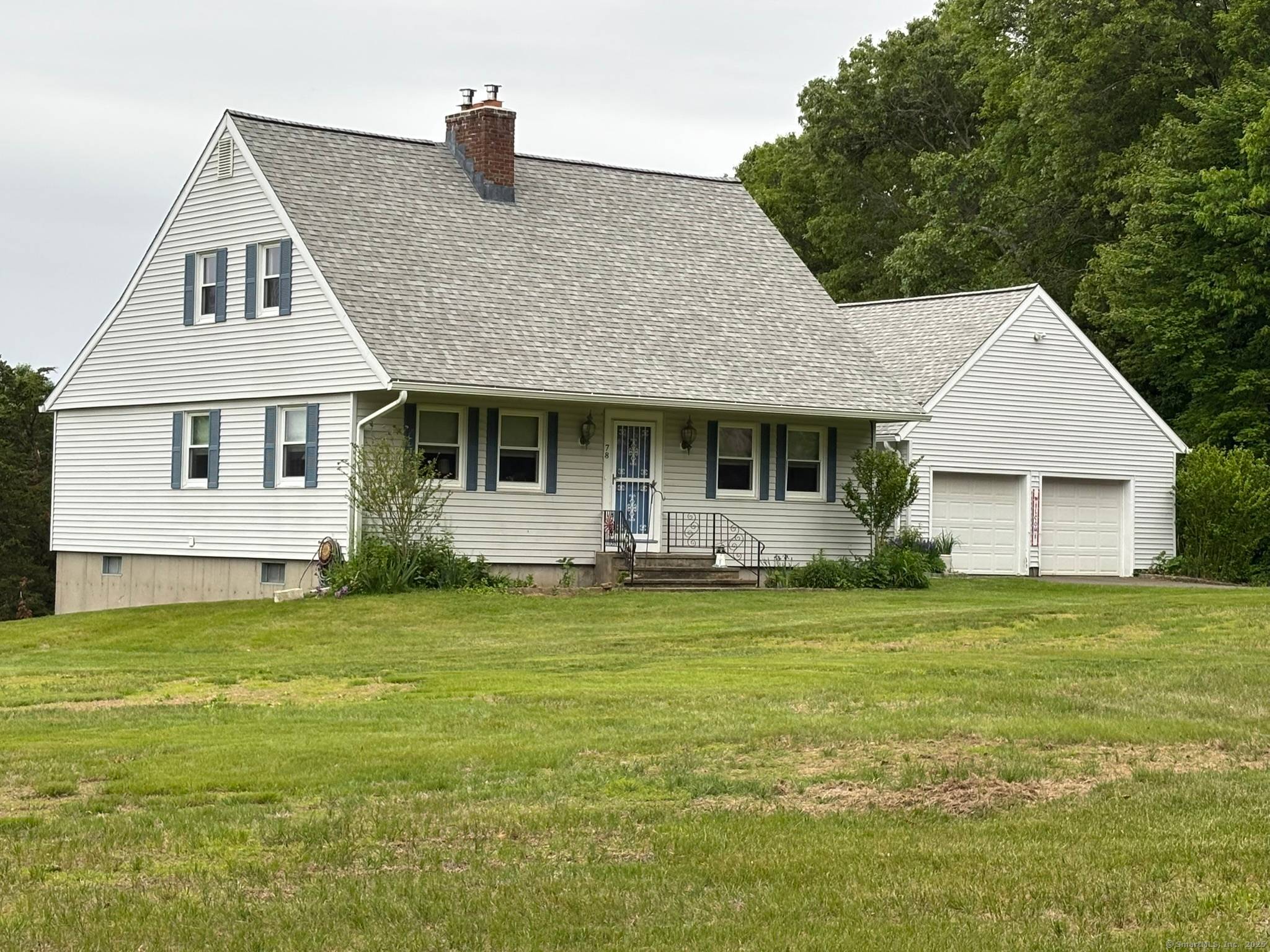 This stunning Cape Cod home is situated on a serene three acre lot at the end of a cul de sac, providing an exceptional level of privacy with its beautifully ...