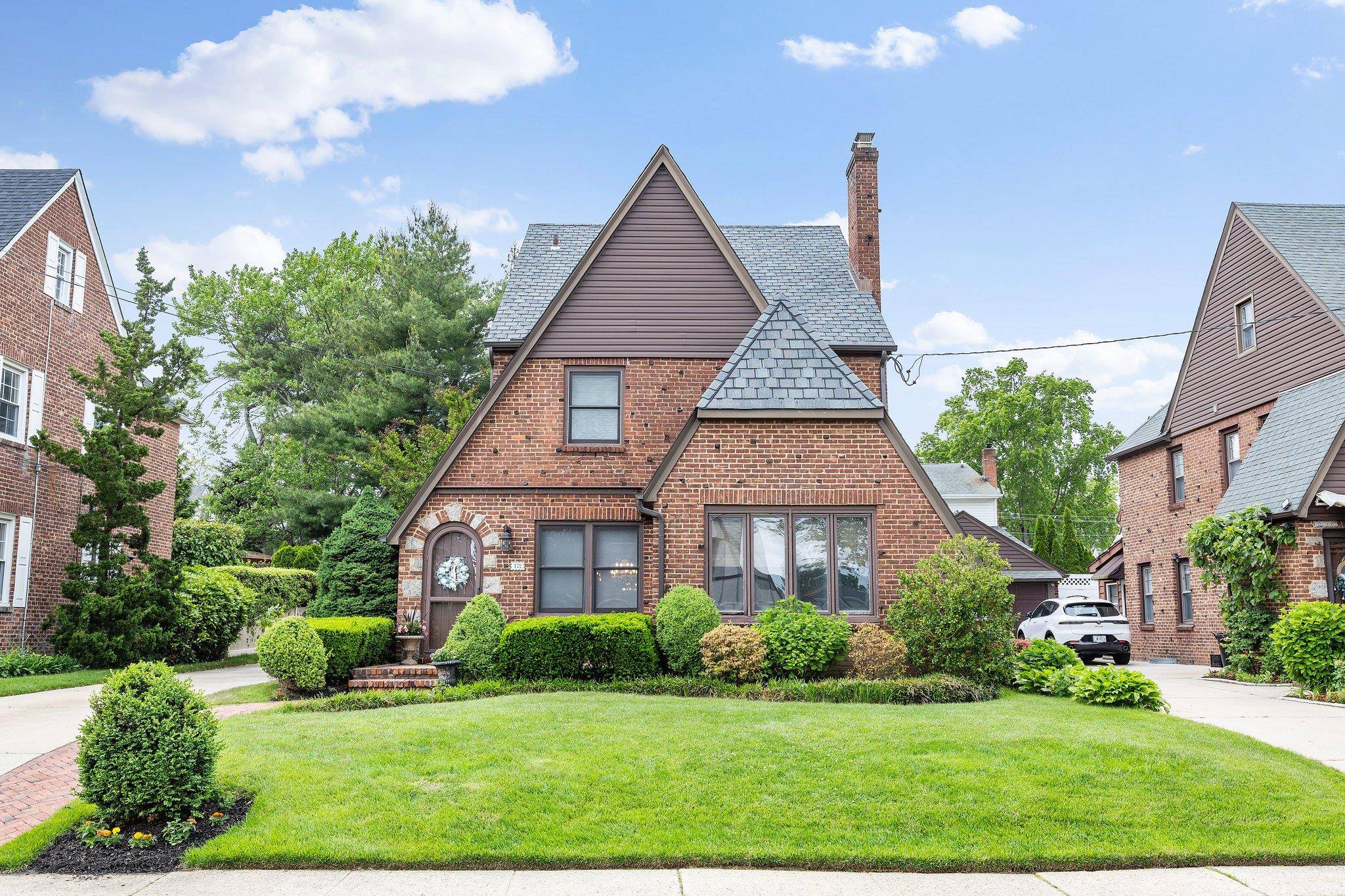 Nestled on a picturesque, tree lined street, this beautiful 2, 000 sq.