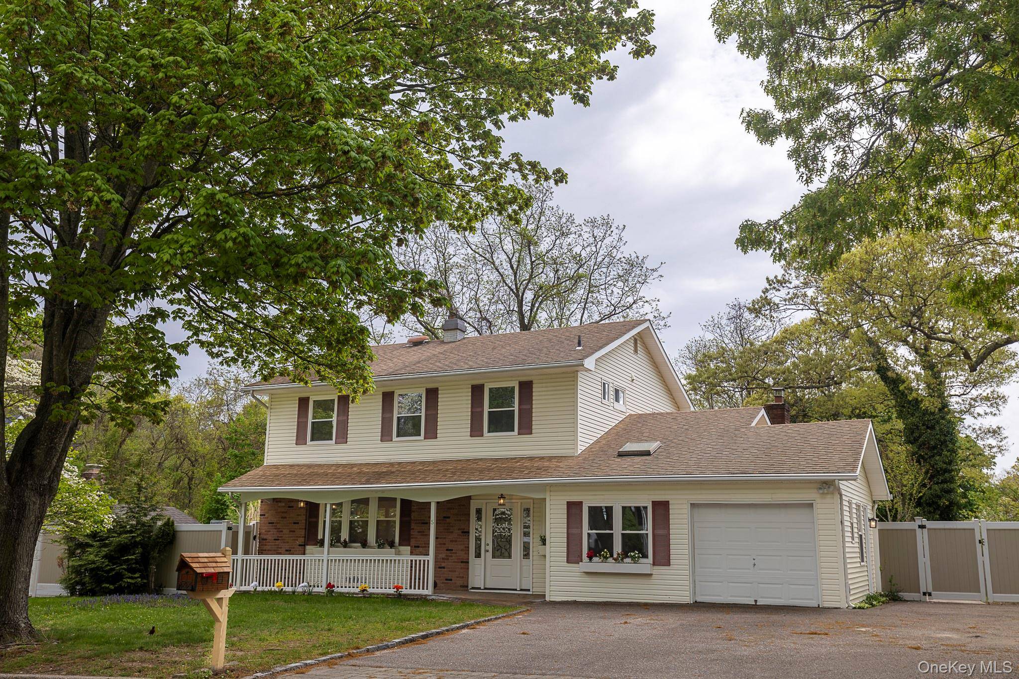 BACK ON THE MARKET ! ! due to a death in the family This fully and beautifully renovated home boasts 5 bedrooms and 4 baths !