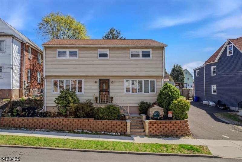 Welcome to 58 Mozart Street, a center hall colonial with 4 bedrooms in East Rutherford !