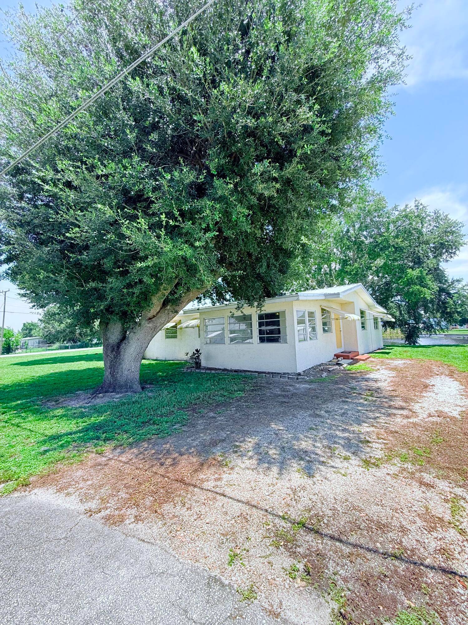 This beautifully renovated 3 bedroom, 1 bath home is the perfect lakeside retreat with direct access to Lake Okeechobee and your very own boat slip !