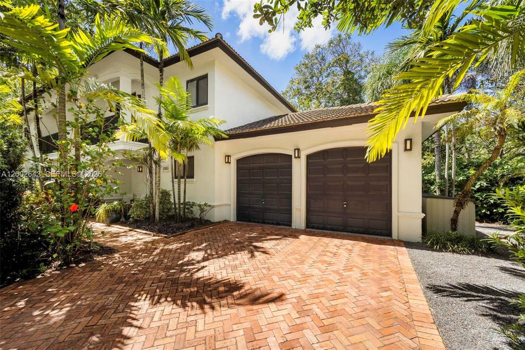 Located in the heart of Coconut Grove, this 4 bedroom, 4 bath residence offers 3, 404 SF of well designed living space, seamlessly blending comfort and functionality.