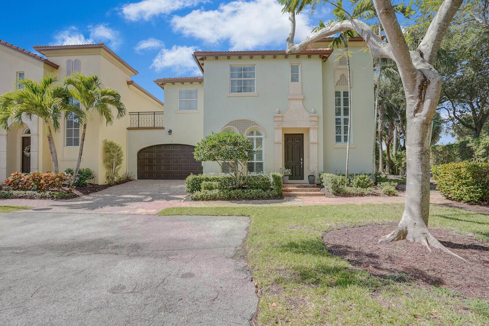 138 VIA PALMA LANE a beautifully appointed 4BR 3BA home located in the exclusive gated community of Royal Poinciana in East Boca Raton.