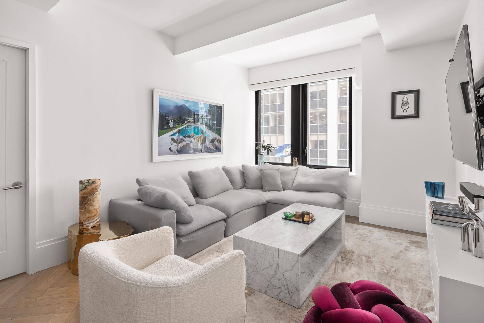 Welcome to a sophisticated urban oasis nestled in the heart of the financial district a fully furnished one bedroom rental at 101 Wall Street, New York.