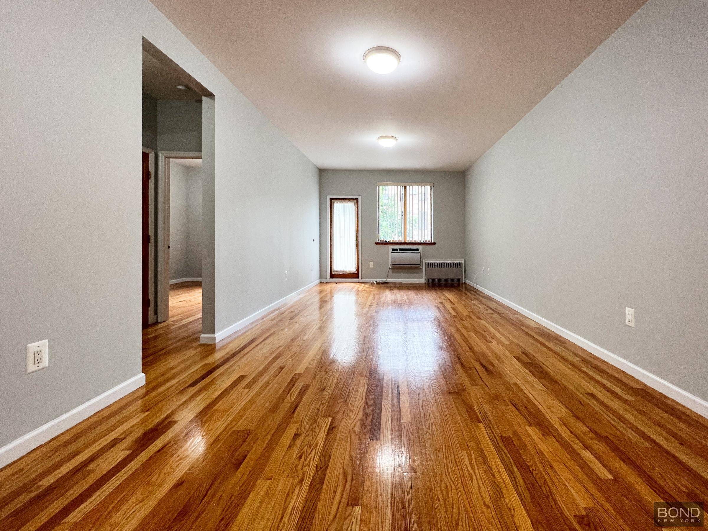 Situated on the second floor of a three unit home in Greenpoint, this massive floor through unit features three bedrooms and one and a half bathrooms.