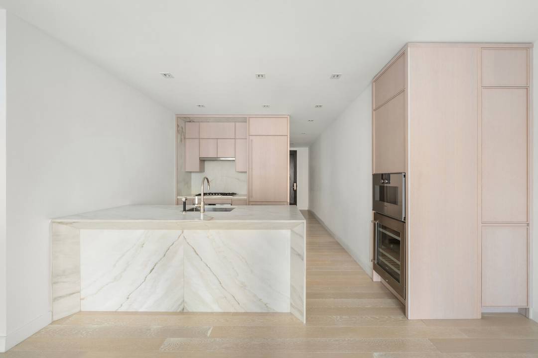 This elegant one bedroom, one bathroom residence, designed by Champalimaud, showcases sweeping northeast views of the Manhattan skyline through expansive floor to ceiling windows.