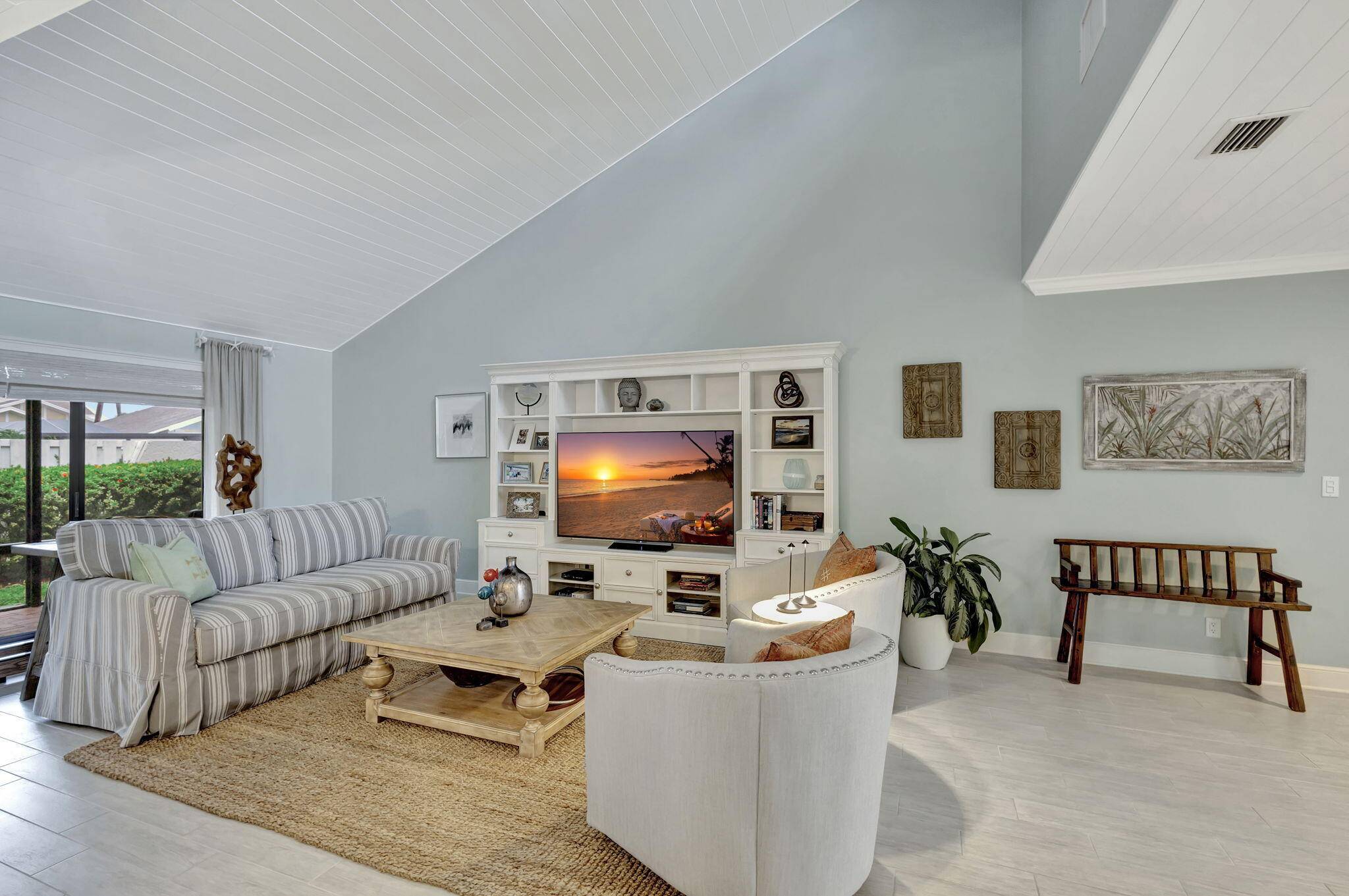 Step into the charm of this beautifully renovated end unit townhouse in Cape Pointe, part of Jonathan's Landing in Jupiter, Florida.