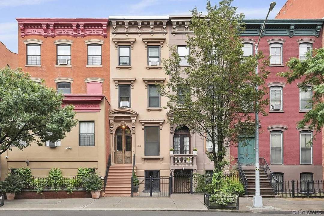 Charming East Harlem 3 family townhouse on Pleasant Avenue featuring updated interiors, hardwood floors, and excellent income potential.
