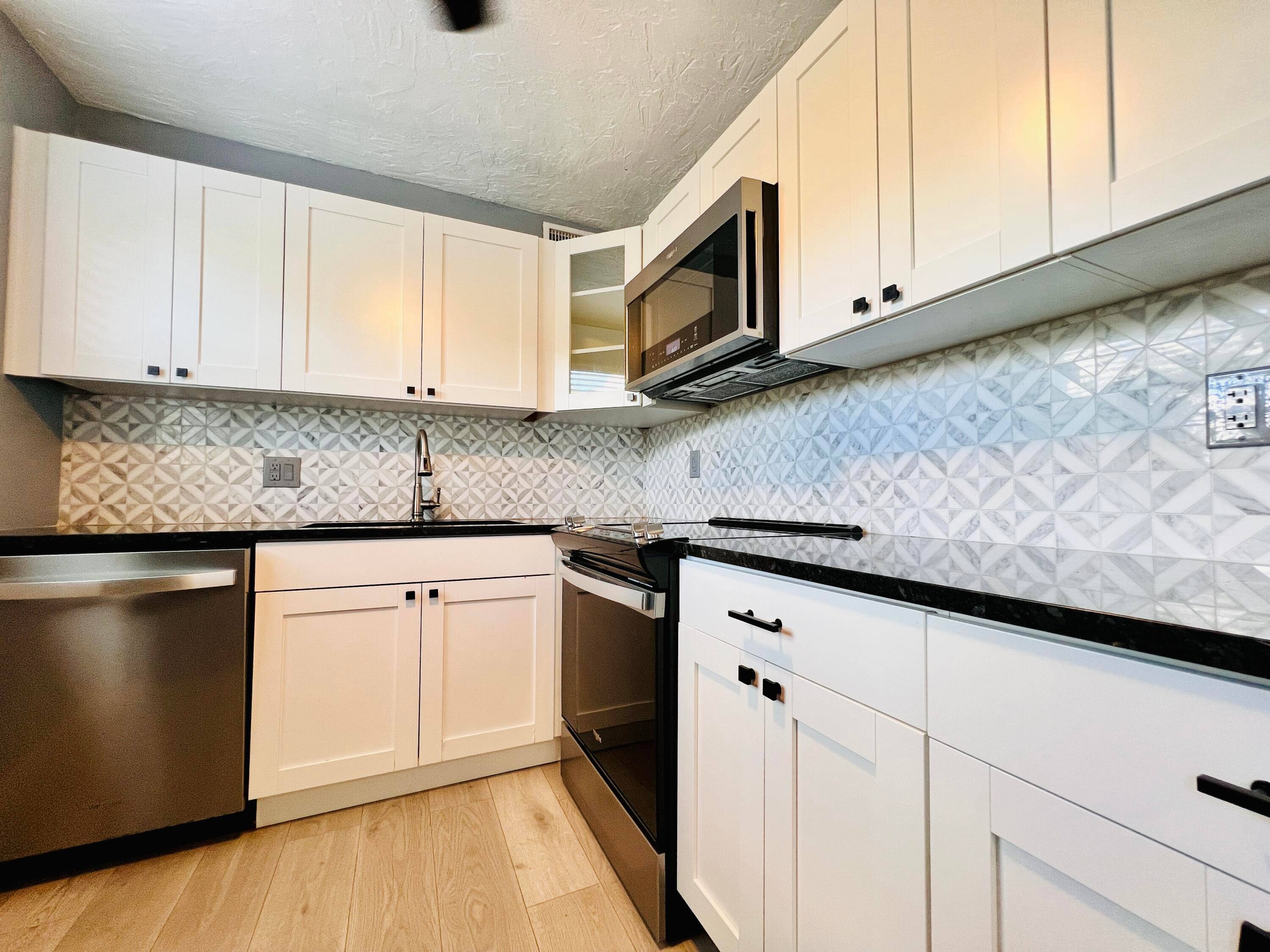 Beautifully Updated With WATER VIEWS in 55 Century Village !