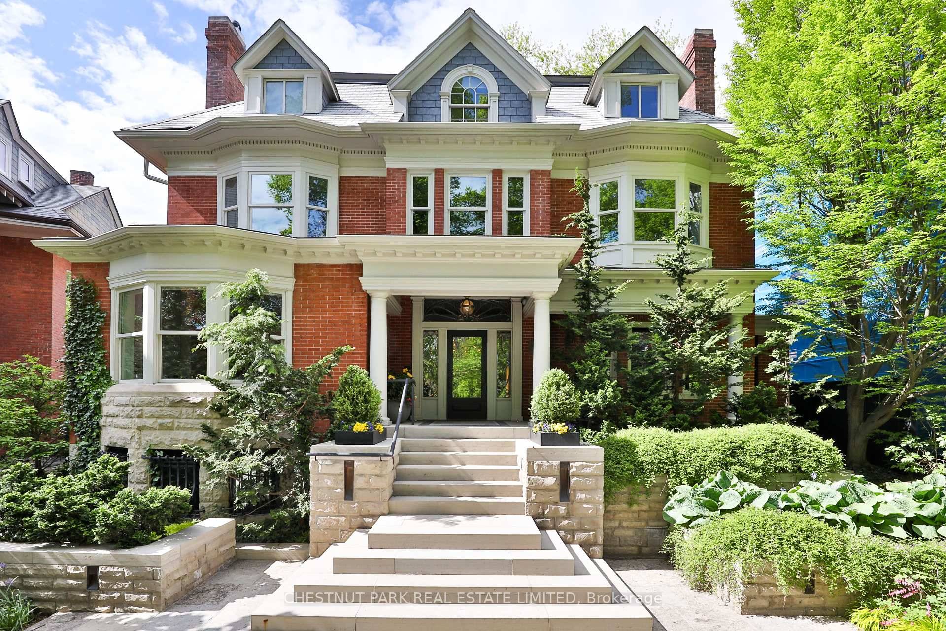Architectural Digest quality with a 2 storey coach house, double car garage, circular drive and parking for 7 cars.