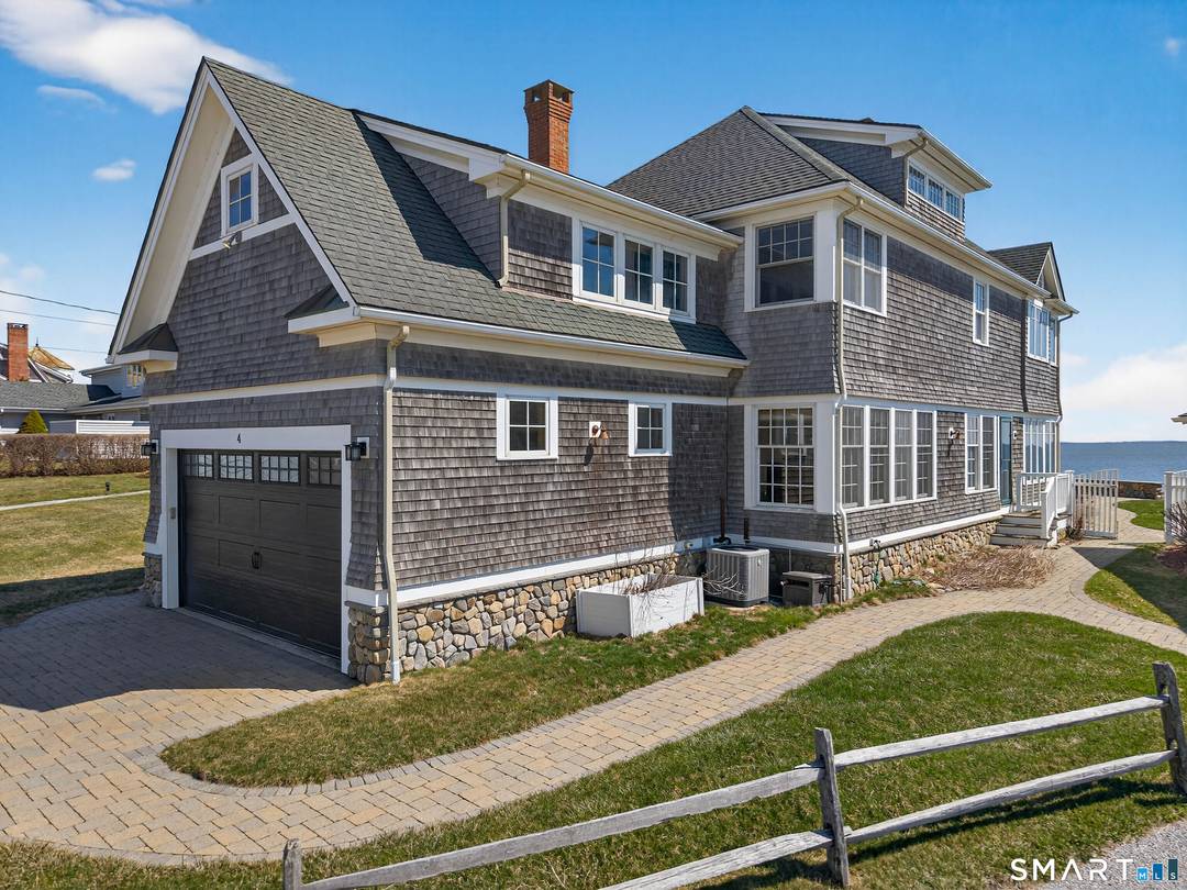 A rare opportunity to enjoy this stunning luxury waterfront home located in desirable Cornfield Point Beach.