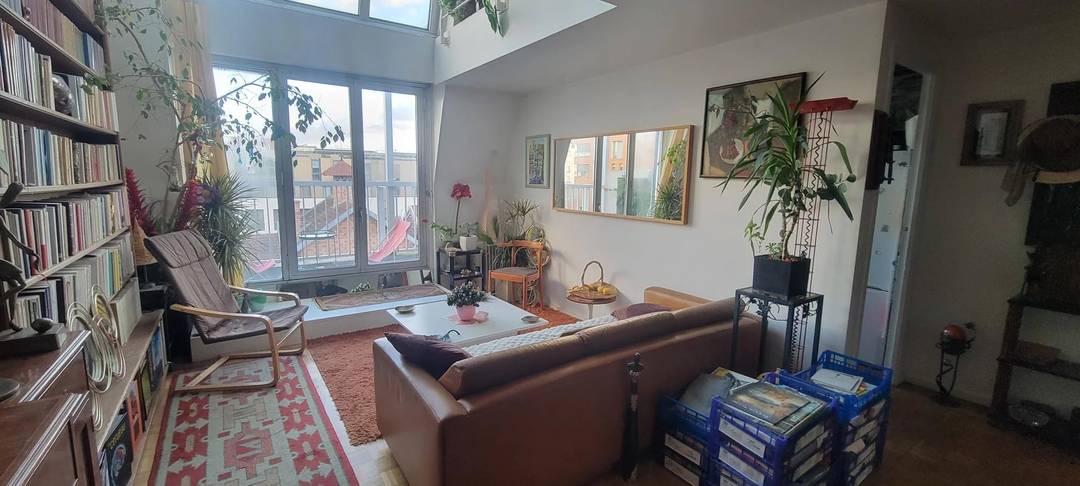 Duplex esprit atelier d’artiste de 117,5 m² avec terrasses vue Tour Eiffel