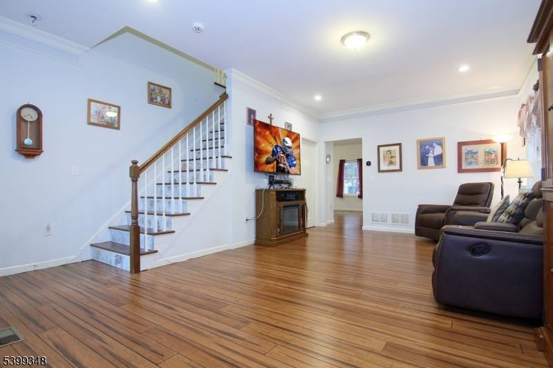 Welcome to this beautifully maintained home, built in 2017 and perfectly located just minutes from Metropark Station ideal for NYC commuters.