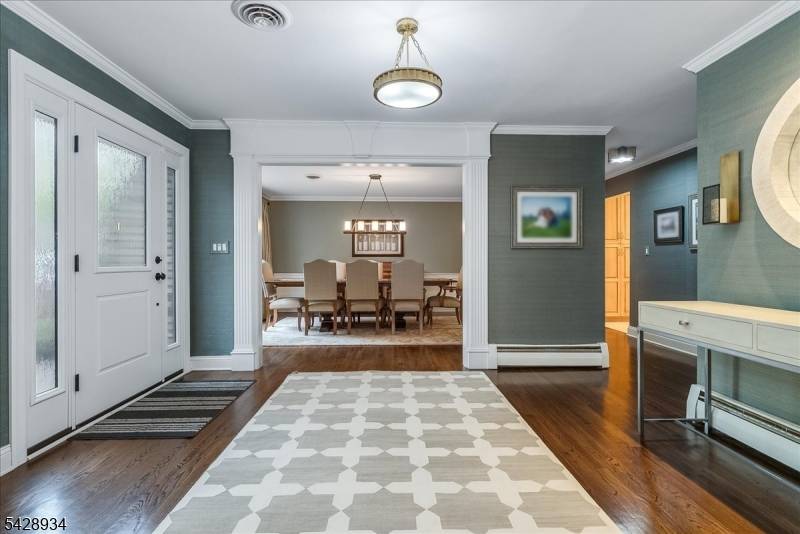 Beautifully renovated custom home in Springfield's Baltusrol Top neighborhood on a private.
