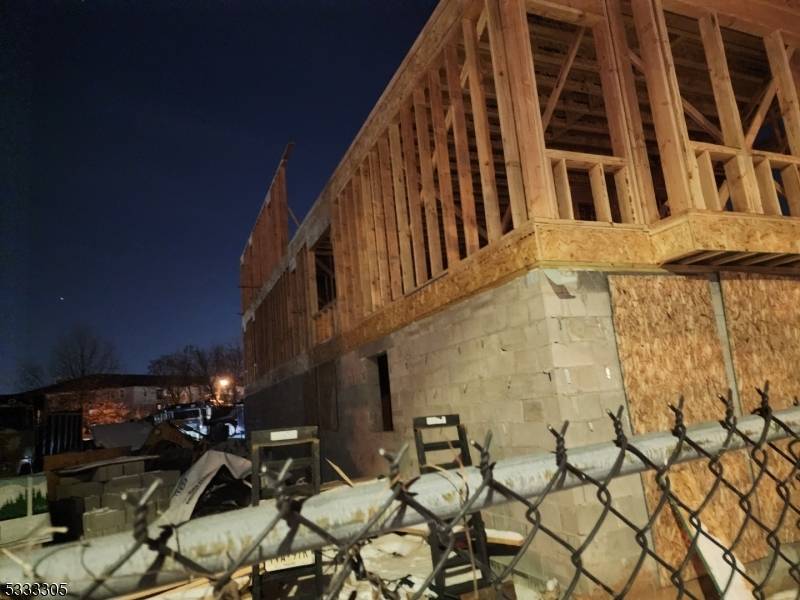 This is a brand new 3 family house under construction located close to Newark Liberty International Airport.