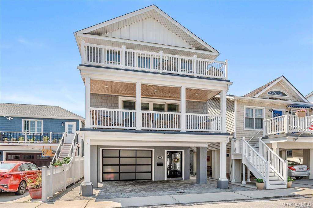 This spacious and beautifully appointed 4 bedroom, 3 bath home was completely custom designed and professionally decorated, offering a perfect blend of beachside sophistication and everyday comfort.