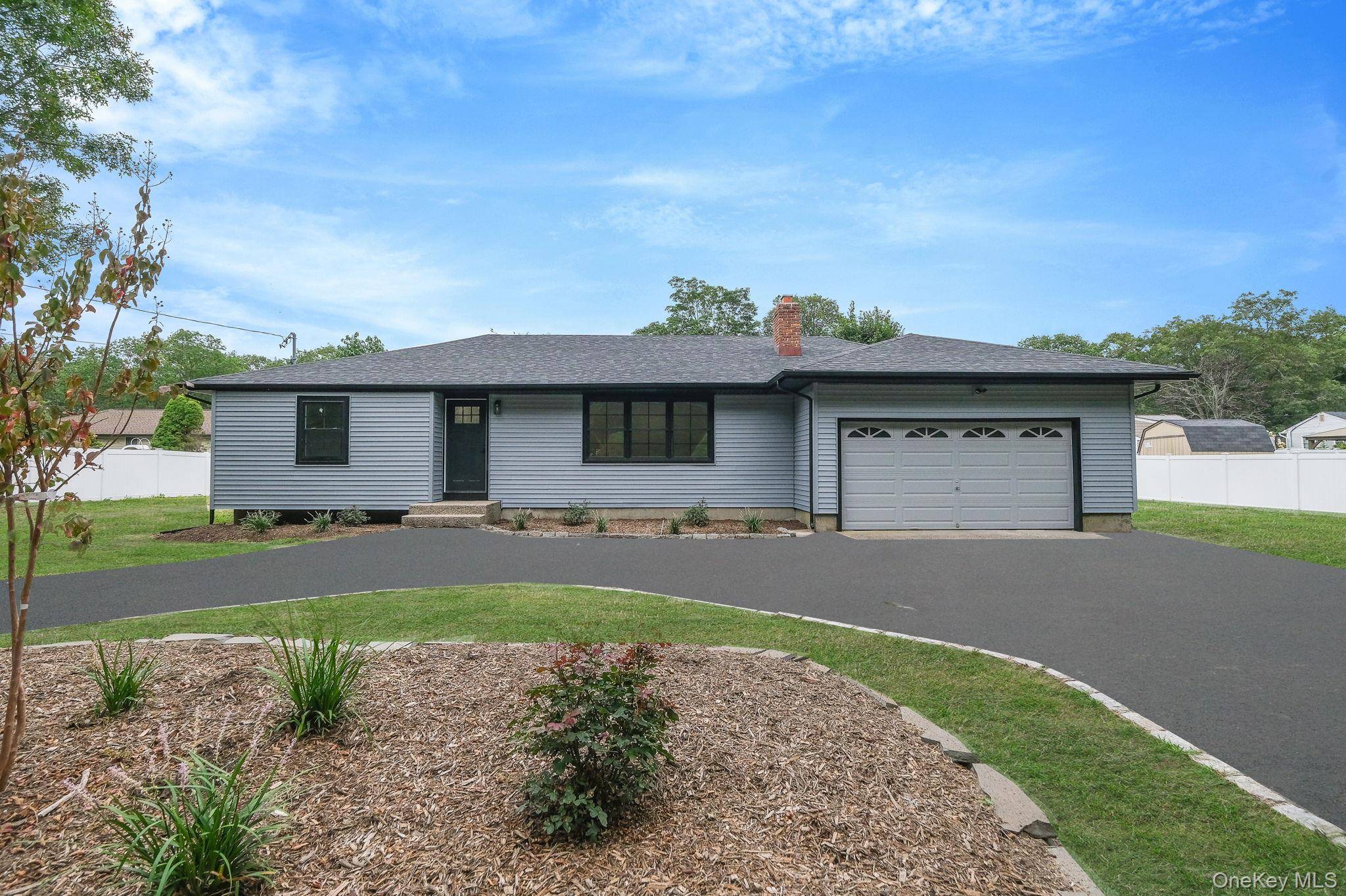 Fully renovated ranch style home offering 3 bedrooms, 2 full bathrooms, with a fireplace and a full unfinished basement with high ceilings.