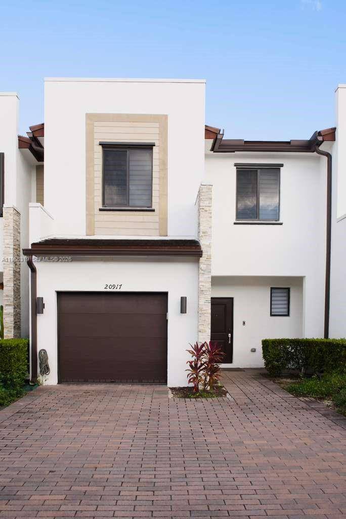 Beautifully upgraded modern townhome in Vistas Via Ventura, a newly built gated community with resort style amenities in a prime location.