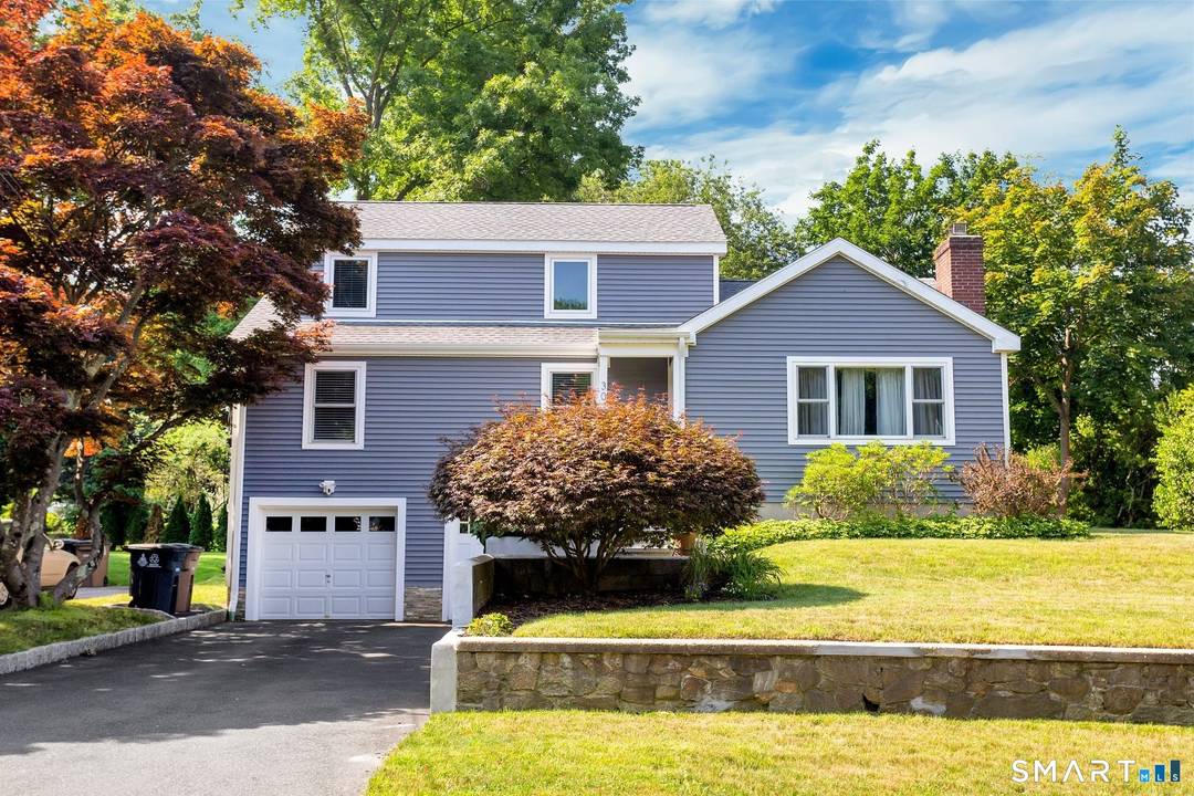 Nestled in Stamford's highly sought after Waterside neighborhood, this beautifully reimagined 5BR 2.