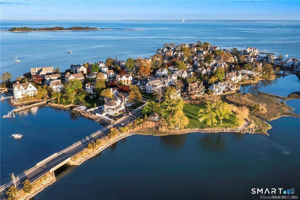 Set along tranquil Farm Creek, this Bell Island cottage offers serene water views ensuring privacy and a picturesque natural backdrop.