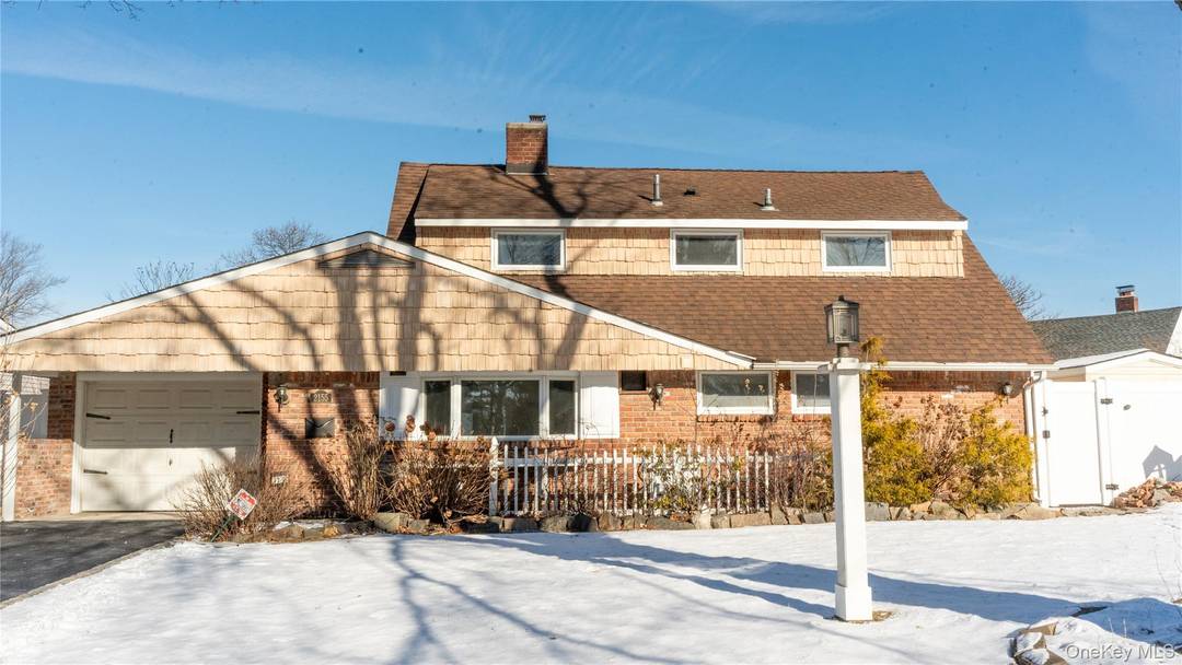 Fully renovated expanded ranch offering timeless charm, modern elegance, and an exceptional location.