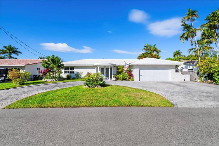 Welcome to your WATERFRONT dream home in the exclusive, gated community of Bal Harbour Fort Lauderdale's hidden gem.