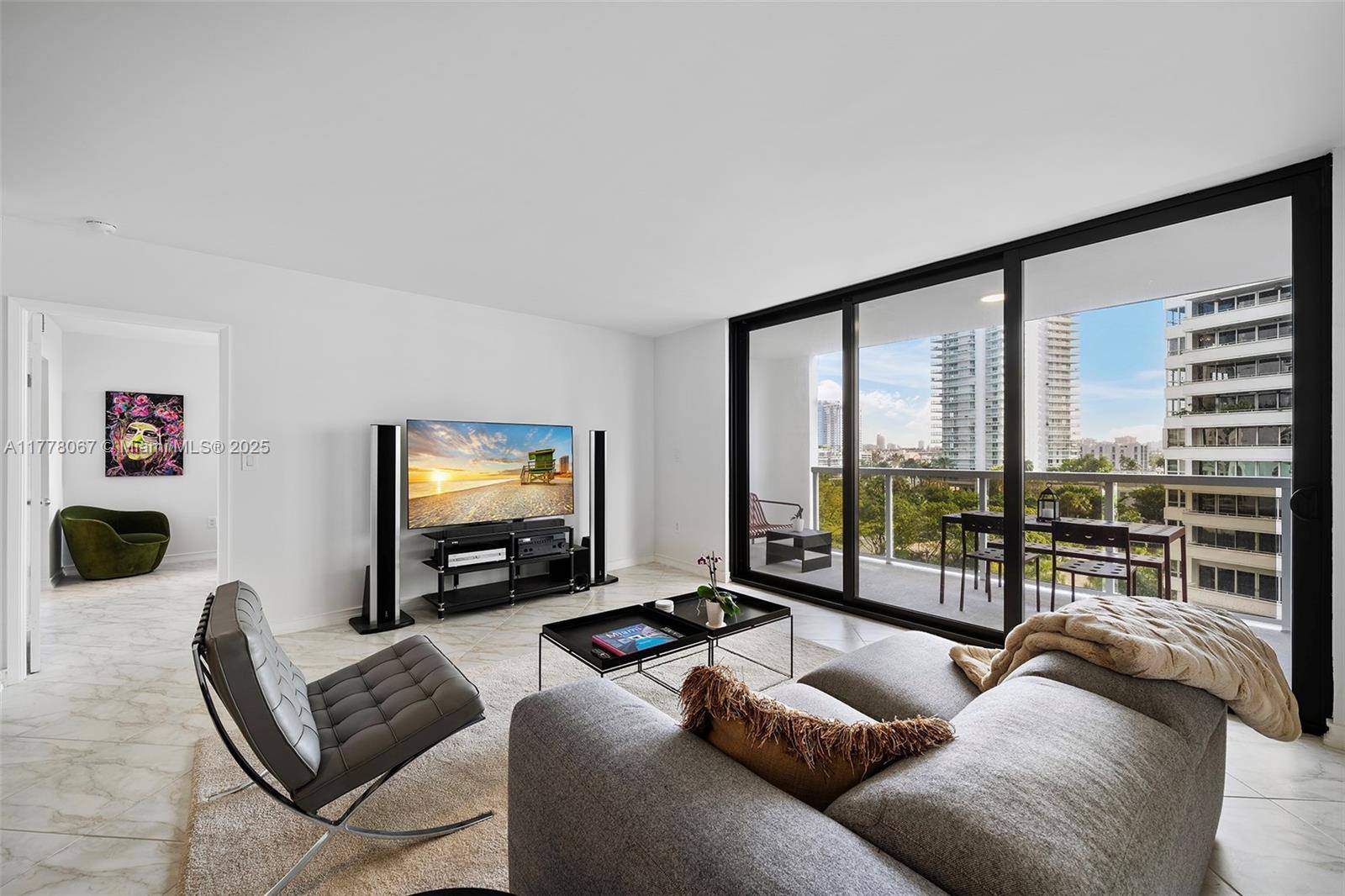 Welcome home to Unit 710 at 9 Island An elegantly renovated 2 bedroom in one of Miami Beach s most desirable neighborhoods, Belle Isle.