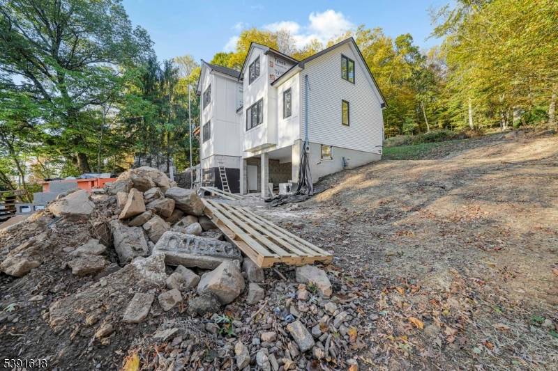 NEW CONSTRUCTION ! Quality finishes and attention to detail in every corner on over 1.