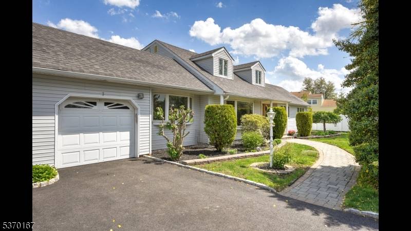 Welcome to 3 Woodhaven Rd, a beautifully expanded ranch nestled in the heart of Parsippany !