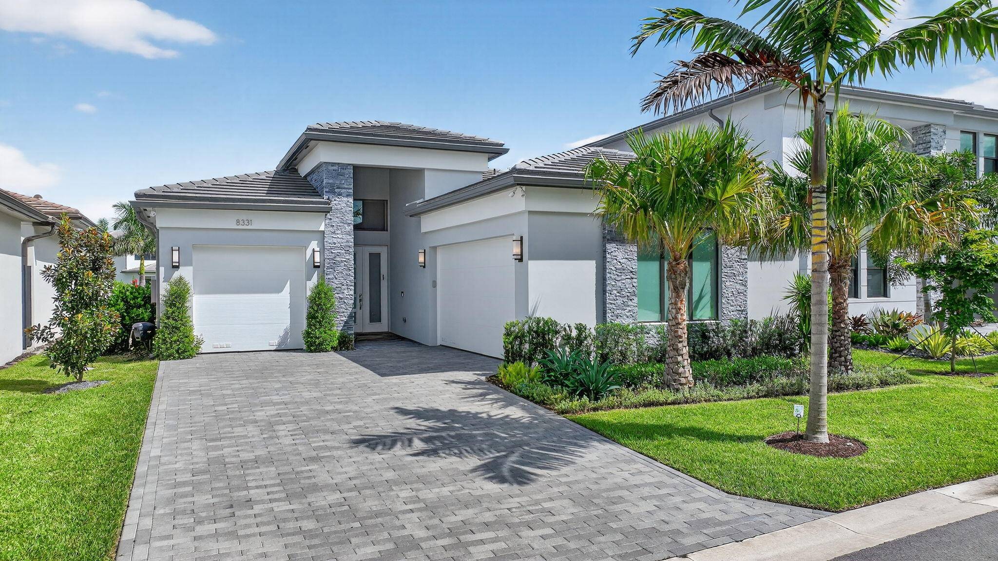 Beautifully decorated one story, 3 bedroom office home with quiet lake views in Lotus Palm !